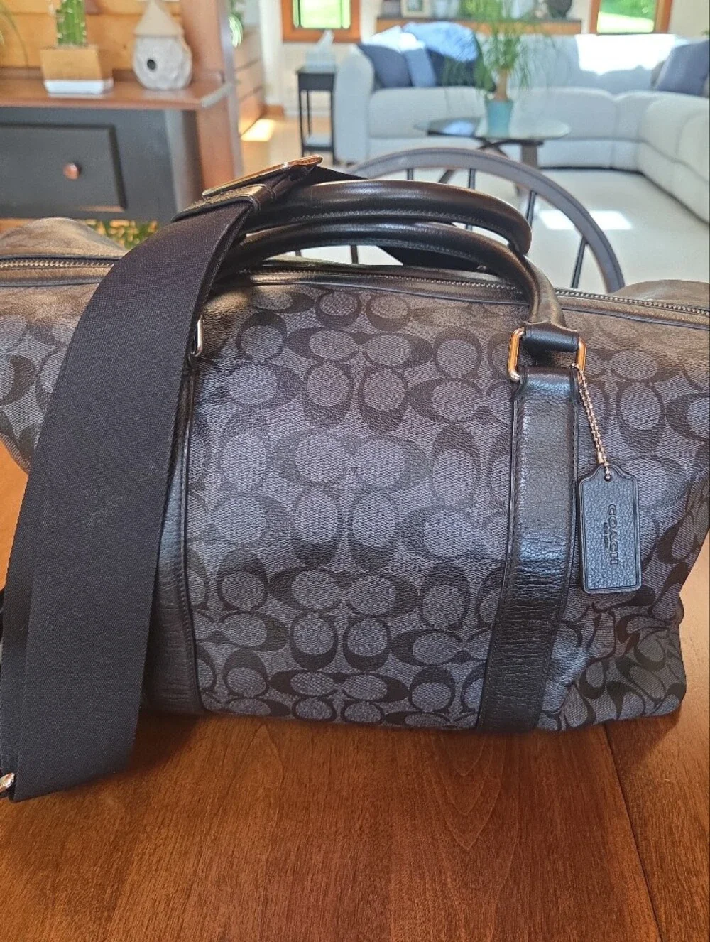 Coach Black Signature Leather Weekender tote bag dark gray and black.